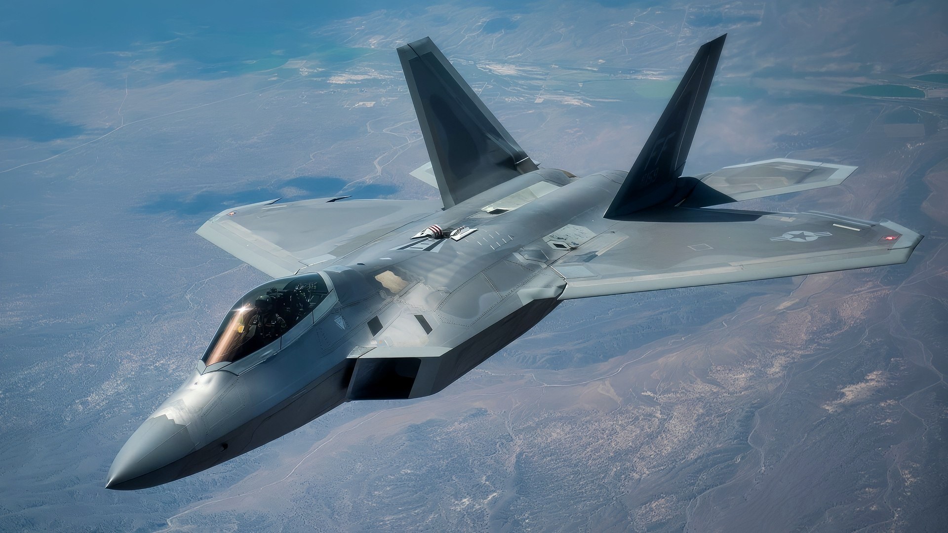 An F-22 Raptor from Langely Air Force Base, V.a. flies by after receiving fuel from a KC-135 Stratotanker from McConnell Air Force Base, Kans., July 27, 2016 during exercise Red Flag, hosted by Nellis Air Force Base, Nev. Red Flag 16-3 is aimed at teaching service members how to integrate air, space and cyberspace elements. (U.S. Air Force photo/Tech. Sgt. David Salanitri)