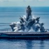The aircraft carrier USS Gerald R. Ford (CVN 78) successfully completes the third and final scheduled explosive event of Full Ship Shock Trials while underway in the Atlantic Ocean, Aug. 8, 2021. The U.S. Navy conducts shock trials of new ship designs using live explosives to confirm that our warships can continue to meet demanding mission requirements under harsh conditions they might encounter in battle. (U.S. Navy photo by Mass Communication Specialist 3rd Class Novalee Manzella)