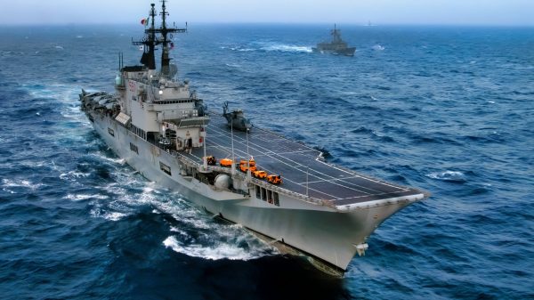 Atlantic Ocean (July 12, 2004) -- The Italian aircraft carrier ITS Guiseppe Garibaldi (C 551) and the Turkish frigate TCG Gediz (F 495) steam through the Atlantic Ocean while participating in Majestic Eagle 2004. Majestic Eagle is a multinational exercise involving multiple allied nations working side by side in a realistic and challenging training environment to prepare for and conduct integrated operations with multiple aircraft carriers and other vessels. Official U.S. Navy photo by Photographer's Mate Airman Rob Gaston. Image released by LT. K.R. Stephens, PAO-CVN-65.