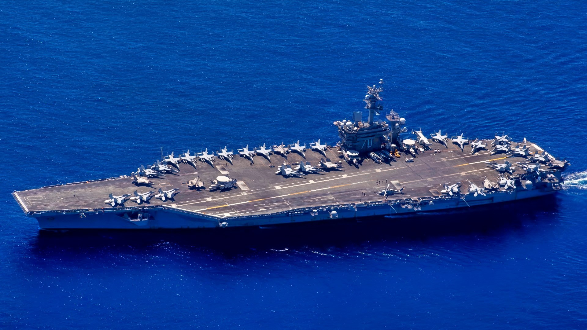(Dec. 17, 2021) Nimitz-class aircraft carrier USS Carl Vinson (CVN 70) transits the Indian Ocean during a bilateral training exercise with the Royal Australian Air Force, Dec. 17, 2021. Carl Vinson Carrier Strike Group and elements of the Royal Australian Navy and Air Force are conducting a bilateral training exercise to test and refine warfighting capabilities in support of a free and open Indo-Pacific. (U.S. Navy photo by Mass Communication Specialist 1st Class Tyler R. Fraser)
