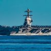 The Arleigh Burke-class guided-missile destroyer USS Winston S. Churchill (DDG 81) sails alongside the world’s largest aircraft carrier the USS Gerald R. Ford (CVN 78), Sep. 24, 2025. Winston S. Churchill, as part of Carrier Strike Group 12, is on a scheduled deployment in the U.S. 6th Fleet area of operation to support the warfighting effectiveness, lethality and readiness of U.S. Naval Forces, Europe-Africa, and defend U.S. Allied and partner interest in the region. (U.S. Navy photo by Mass Communication Specialist Seaman Hector Rodriguez)