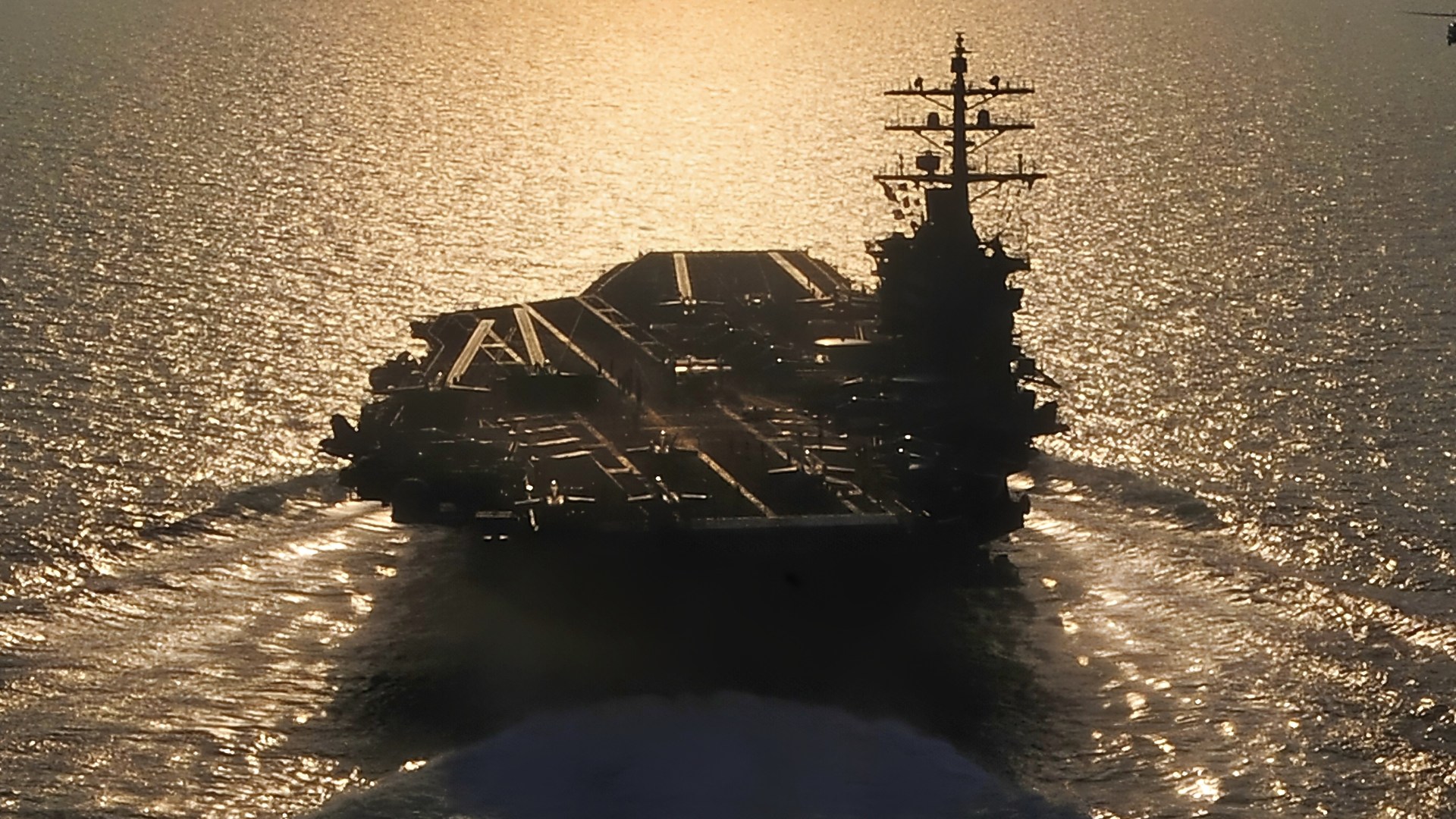 120710-N-RY232-571 MEDITERRANEAN SEA (July 10, 2012) - An SH-60F Seahawk from the Nightdippers of Helicopter Anti-Submarine Squadron (HS) 5 flies alongside Nimitz-class aircraft carrier USS Dwight D. Eisenhower (CVN 69), July 10. Dwight D. Eisenhower is on a regularly scheduled deployment in support of Maritime Security Operations (MSO) and Theater Security Cooperation (TSC) efforts in the U.S. 5th and 6th Fleet areas of responsibility. IKE deployed as part of Eisenhower Carrier Strike Group (CSG), which includes CSG 8, IKE, guided-missile cruiser USS Hue City (CG 66), guided-missile destroyer USS Farragut (DDG 99), guided-missile destroyer USS Winston S. Churchill (DDG 81), USS Jason Dunham (DDG 109), the seven squadrons of Carrier Air Wing (CVW) 7, and Destroyer Squadron 28. (U.S. Navy photo by Mass Communication Specialist 2nd Class Julia A. Casper/Released)