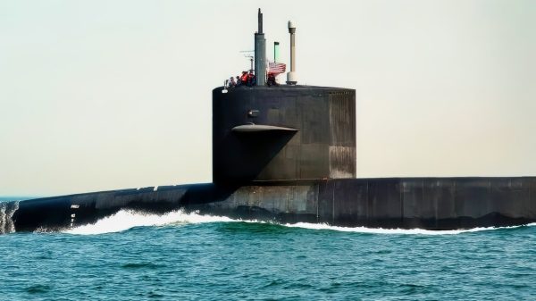 (March 31, 2006) - The guided missile submarine USS Florida (SSGN 728) conducts sea trials off the coast of Virginia. Florida will be delivered to the Fleet in April, and a Return To Service ceremony is scheduled for May 25 in Mayport, Fla. As the second of four SSBN submarines to be converted to SSGN, this nuclear-powered submarine will have the capability to: launch up to 154 Tomahawk cruise missiles; conduct sustained special warfare operations with up to 102 Special Operations Forces (SOF) personnel for short durations or 66 SOF personnel for sustained operations; and provide approximately 70 percent operational availability forward deployed in support of combatant mission requirements. U.S. Navy photo by Chief Journalist (SW/AW) Dave Fliesen.