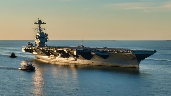 (April 14, 2017) The aircraft carrier Pre-Commissioning Unit (PCU) Gerald R. Ford (CVN 78) pulls into Naval Station Norfolk for the first time. The first-of-class ship - the first new U.S. aircraft carrier design in 40 years - spent several days conducting builder's sea trails, a comprehensive test of many of the ship's key systems and technologies. (U.S. Navy photo by Matt Hildreth courtesy of Huntington Ingalls Industries/Released)