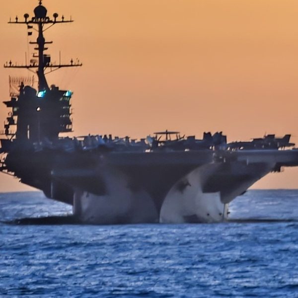 151111-N-KM939-021 PACIFIC OCEAN (Nov. 11, 2015) - USS John C. Stennis (CVN 74) travels behind the guided-missile destroyer USS Stockdale (DDG 106) during a Missile Exercise (MSLEX). Sailors from the John C. Stennis Strike Group are participating in a sustainment training exercise (SUSTEX) to prepare for future deployments. (U.S. Navy photo by Mass Communication Specialist 3rd Class David A. Cox/Released)