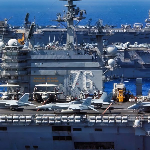 USS Ronald Reagan (CVN 76), USS Kitty Hawk (CV 63), and USS Abraham Lincoln (CVN 72) cruise side-by-side in the Philippine Sea June 18, 2006, during exercise Valiant Shield 2006. The joint exercise consists of 28 naval vessels, more than 300 aircraft, and approximately 20,000 service members from the Navy, Army, Air Force, Marine Corps and Coast Guard. (U.S. Navy photo by Chief Photographer's Mate Spike Call) (Released)