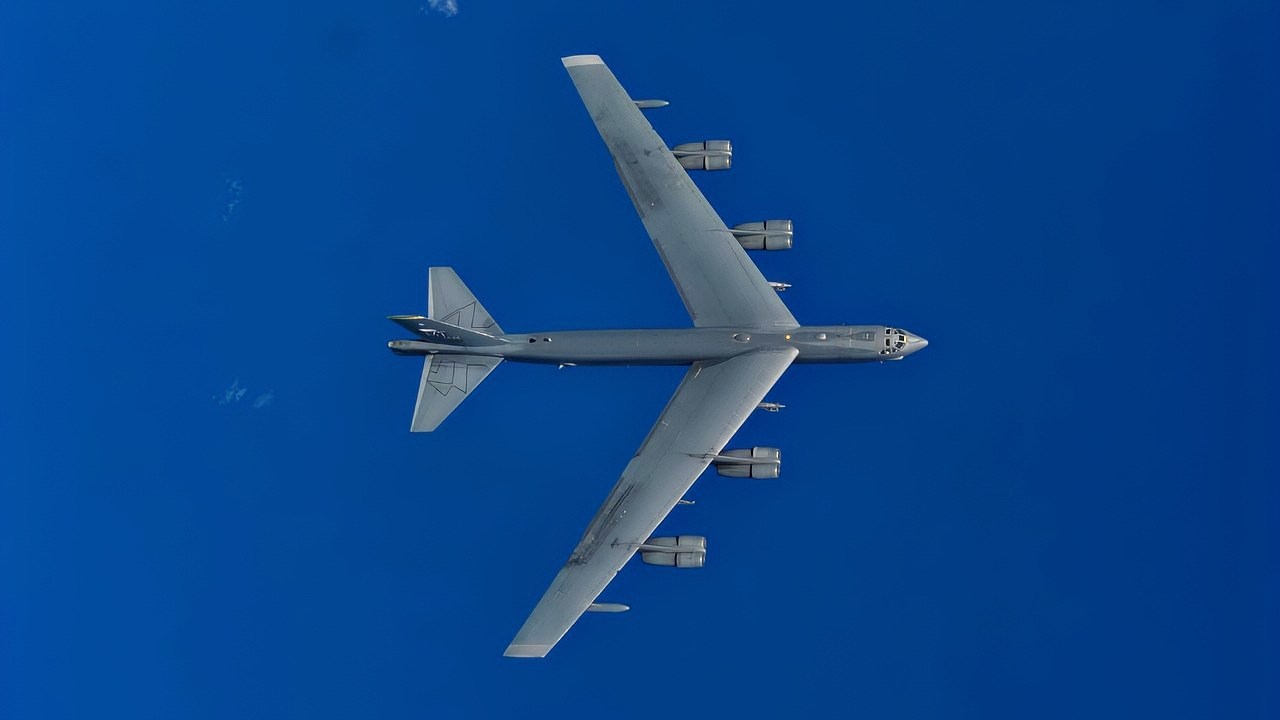 A B-52H Stratofortress from the 69th Bomb Squadron, Minot Air Force Base, N.D., flies over the Pacific Ocean during an international sinking exercise for Rim of the Pacific 2016 near Joint Base Pearl Harbor-Hickam, July 14, 2016. Twenty-six nations, more than 40 ships and submarines, more than 200 aircraft, and 25,000 personnel are participating in RIMPAC from June 30 to Aug. 4 in and around the Hawaiian Islands and Southern California. The world's largest international maritime exercise, RIMPAC, provides a unique training opportunity that helps participants foster and sustain the cooperative relationships that are critical to ensuring the safety of sea lanes and security on the world's oceans. RIMPAC 2016 is the 25th exercise in the series that began in 1971. (U.S. Air Force photo by Tech. Sgt. Aaron Oelrich/Released)