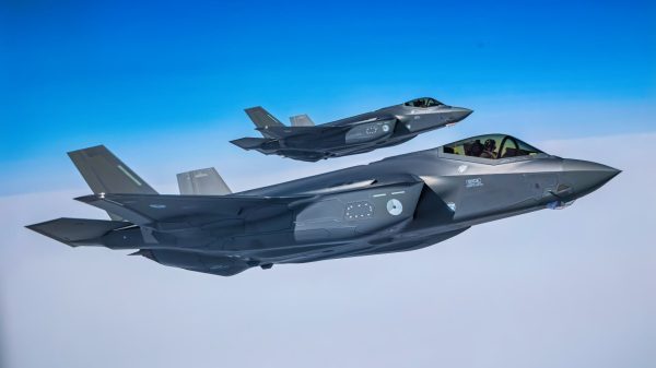 Two Dutch F-35 Lightnings patiently wait for their opportunity to maneuver into position to receive more fuel mid-air from a KC-135 Stratotanker over the Arctic Circle, May 31, 2023. The 101st ARW is taking part in Arctic Challenge Exercise 2023, a live fly exercise that serves to advance arctic security initiatives and enhance interoperability in the increasingly dynamic and contested region.