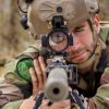 French Staff Sgt. Guillaume Duatriche, a sniper, 1st Infantry Regiment, Republican Guard, look through the scope of the M110 Semi-Automatic Sniper System during the Designated Marksman course at Naval Weapons Station Yorktown, Virginia, April 9, 2024. Duatriche is the first French military member to attend the Designated Marksman Course (DMC), hosted by Marine Corps Security Forces Regiment (MCSFR). MCSFR DMC instructors train students from the U.S. Marine Corps, the Joint Services, and international allies to become highly skilled in marksmanship, range estimation, and observation in support of expeditionary security operations and security for vital assets. (U.S. Marine Corps photo by SSgt. Servante R. Coba)