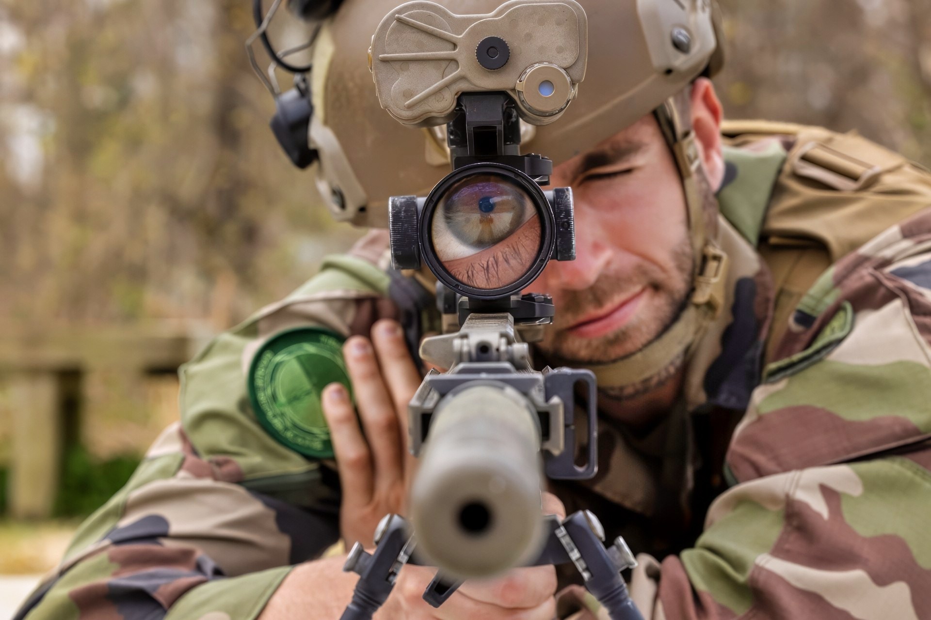 French Staff Sgt. Guillaume Duatriche, a sniper, 1st Infantry Regiment, Republican Guard, look through the scope of the M110 Semi-Automatic Sniper System during the Designated Marksman course at Naval Weapons Station Yorktown, Virginia, April 9, 2024. Duatriche is the first French military member to attend the Designated Marksman Course (DMC), hosted by Marine Corps Security Forces Regiment (MCSFR). MCSFR DMC instructors train students from the U.S. Marine Corps, the Joint Services, and international allies to become highly skilled in marksmanship, range estimation, and observation in support of expeditionary security operations and security for vital assets. (U.S. Marine Corps photo by SSgt. Servante R. Coba)