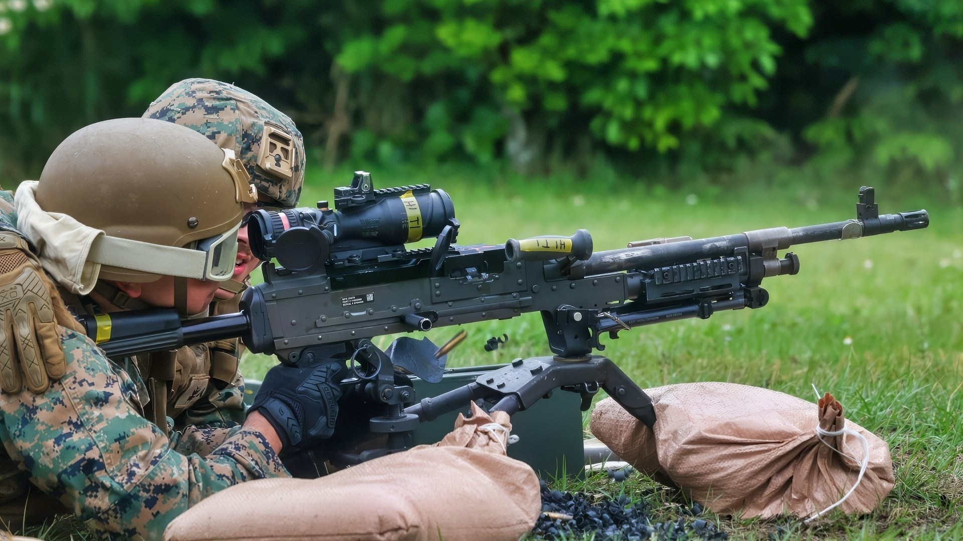 A U.S. Marine with Marine Air Support Squadron 2, Marine Air Control Group 18, 1st Marine Aircraft Wing changes an M240B machine gun barrel in the Central Training Area, Okinawa, Japan, May 13, 2025. MASS-2 conducted live-fire training, improving their proficiency with crew-served weapon systems and enhanced force protection capabilities in an expeditionary advanced base operations environment. (U.S. Marine Corps photo by Lance Cpl. Ryan Sotodavila)