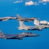 A formation of 4th generation fighter jets from the 40th Flight Test Squadron flies near Eglin Air Force Base, Fla, Jan. 31, 2022. The 40th FLTS executes developmental flight tests for fourth generation fighter aircraft to include the A-10, F-15 and F-16. (U.S. Air Force photo by Tech. Sgt. John Raven)