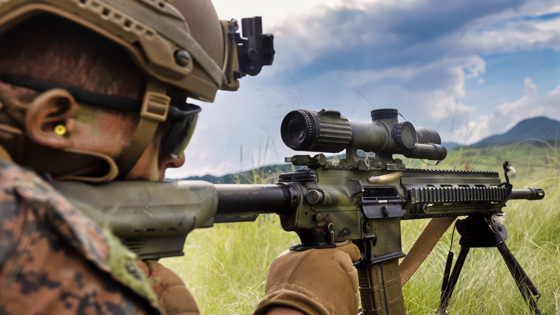 U.S. Marine Corps Cpl. Wyatt Mccullough, a rifleman with 12th Littoral Combat Team, 12th Marine Littoral Regiment, 3rd Marine Division, fires the M27 Infantry Automatic Rifle during Resolute Dragon 25 at Hijudai Maneuver Area, Oita Prefecture, Japan, Sept. 15, 2025. Resolute Dragon is an annual bilateral exercise in Japan that strengthens the command, control, and multi-domain maneuver capabilities of U.S. Marines in III Marine Expeditionary Force and Japan Self-Defense Force personnel, with a focus on controlling and defending key maritime terrain. Mccullough is a native of Texas. (U.S. Marine Corps photo by Lance Cpl. Rodney Frye)