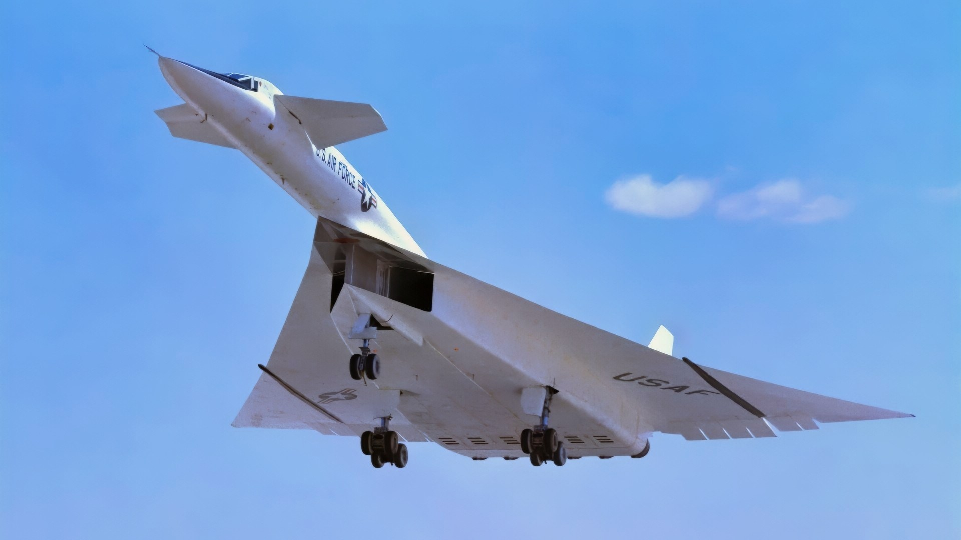 Viewed from the front the #1 XB-70A (62-0001) is shown climbing out during take-off. Most flights were scheduled during the morning hours to take advantage of the cooler ambient air temperatures for improved propulsion efficiencies. The wing tips are extended straight out to provide a maximum lifting wing surface. The XB-70A, capable of flying three times the speed of sound, was the world's largest experimental aircraft in the 1960s. Two XB-70A aircraft were built. Ship #1 was flown by NASA in a high speed flight research program.