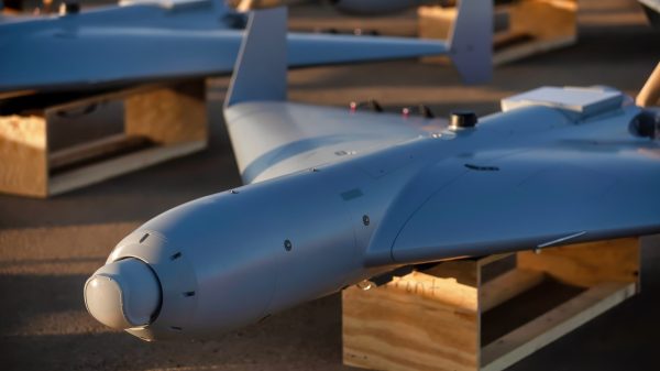 U.S. CENTRAL COMMAND AREA OF RESPONSIBILITY (Nov. 23, 2025) Low-cost Unmanned Combat Attack System (LUCAS) drones are positioned on the tarmac at a base in the U.S. Central Command operating area, Nov. 23. Costing approximately $35,000 per platform, LUCAS drones are providing U.S. forces in the Middle East low-cost, scalable capabilities to strengthen regional security and deterrence. (Courtesy Photo)