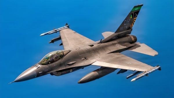 An F-16 Fighting Falcon, assigned to the 180th Fighter Wing, flies alongside a KC-135 Stratotanker with the 121st Air Refueling Wing over the skies of Canada, May 20, 2026. The F-16 Fighting Falcon can fly more than 500 miles, but the KC-135 can extend its radius beyond that and deliver airpower anywhere, anytime, globally. (U.S. Air National Guard photo by Airman 1st Class Taylor Warehime)