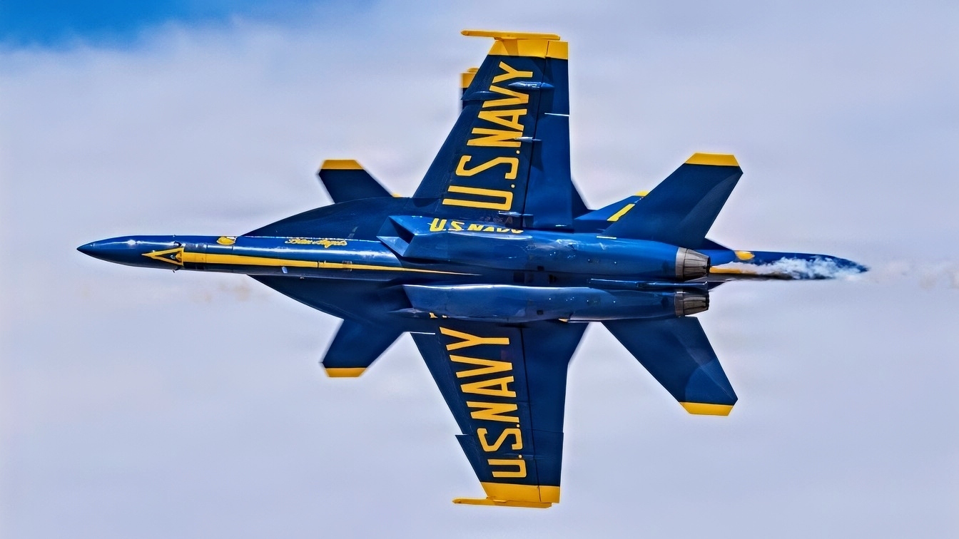 U.S. Navy Blue Angels 5 and 6 fly past each other in an opposing knife edge pass during the Luke Days 2026 airshow, March 22, 2026, at Luke Air Force Base, Arizona. Events like Luke Days 2026 provide insight into the training, preparation and teamwork that enable the joint force to respond quickly and effectively when needed. anytime and anywhere. The U.S. Navy Blue Angels demonstrate the precision, speed and discipline required to operate the F/A-18 Super Hornet, one of the Navy’s frontline carrier-based fighter aircraft. (U.S. Air National Guard photo by Tech. Sgt. Hampton Stramler)