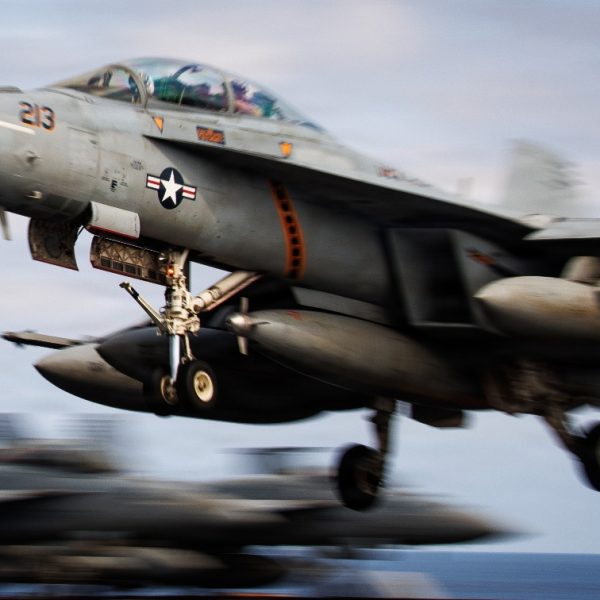 An F/A-18F Super Hornet, attached to Strike Fighter Squadron 213, lands on the flight deck of the world's largest aircraft carrier, USS Gerald R. Ford (CVN 78), while underway in the Mediterranean Sea, April 11, 2026. Gerald R. Ford is on a scheduled deployment in the U.S. 6th Fleet area of operations to support the warfighting effectiveness, lethality and readiness of U.S. Naval Forces Europe-Africa, and defend U.S., Allied and partner interests in the region. (U.S. Navy photo by Mass Communication Specialist 2nd Class Tajh Payne)