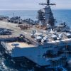 The first-in-class aircraft carrier USS Gerald R. Ford (CVN 78) transits the Atlantic Ocean, March 19, 2023. Ford is underway in the Atlantic Ocean executing its Composite Training Unit Exercise (COMPTUEX), an intense, multi-week exercise designed to fully integrate a carrier strike group as a cohesive, multi-mission fighting force and to test their ability to carry out sustained combat operations from the sea. As the first-in-class ship of Ford-class aircraft carriers, CVN 78 represents a generational leap in the U.S. Navy’s capacity to project power on a global scale. (U.S. Navy photo by Mass Communication Specialist 2nd Class Jackson Adkins)