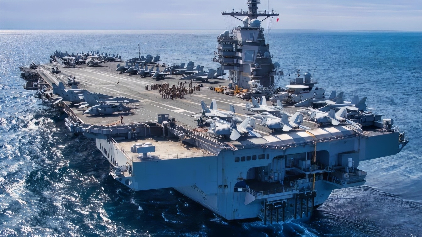 The first-in-class aircraft carrier USS Gerald R. Ford (CVN 78) transits the Atlantic Ocean, March 19, 2023. Ford is underway in the Atlantic Ocean executing its Composite Training Unit Exercise (COMPTUEX), an intense, multi-week exercise designed to fully integrate a carrier strike group as a cohesive, multi-mission fighting force and to test their ability to carry out sustained combat operations from the sea. As the first-in-class ship of Ford-class aircraft carriers, CVN 78 represents a generational leap in the U.S. Navy’s capacity to project power on a global scale. (U.S. Navy photo by Mass Communication Specialist 2nd Class Jackson Adkins)