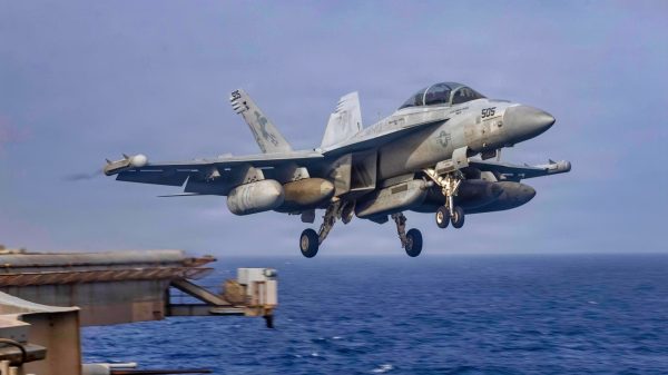 An EA-18G Growler, attached to Electronic Attack Squadron (VAQ) 133, takes off from the flight deck of Nimitz-class aircraft carrier USS Abraham Lincoln (CVN 72), May 21, 2026. Abraham Lincoln is deployed to the U.S. 5th Fleet area of operations to support maritime security and stability in the Middle East. (U.S. Navy photo)