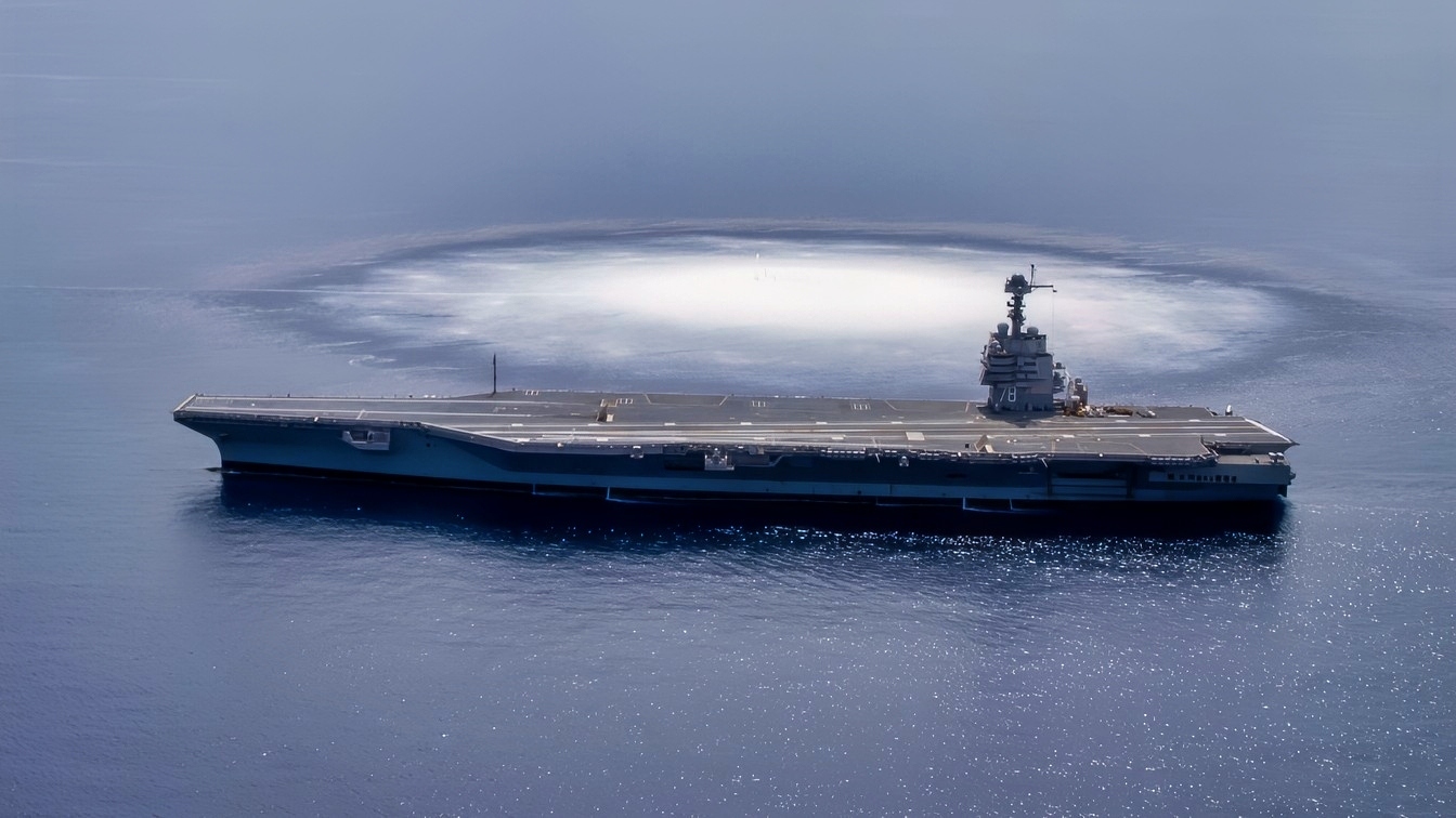 The aircraft carrier USS Gerald R. Ford (CVN 78) completes the first scheduled explosive event of Full Ship Shock Trials while underway in the Atlantic Ocean, June 18, 2021. The U.S. Navy conducts shock trials of new ship designs using live explosives to confirm that our warships can continue to meet demanding mission requirements under harsh conditions they might encounter in battle. (U.S. Navy photo by Mass Communication Specialist 3rd Class Riley B. McDowell)