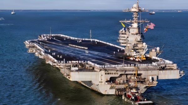 260516-N-FY193-1426 NORFOLK, Va. (May 16, 2026) USS Gerald R. Ford (CVN 78) returned to Naval Station Norfolk, May 16, 2026, following a historic 11-month deployment to U.S. 2nd, 4th, 5th, and 6th Fleets as part of the Gerald R. Ford Carrier Strike Group. Before returning to Norfolk after 326 days, the Gerald R. Ford crew conducted 23 replenishments-at-sea and sailed over 57,713 nautical miles. Embarked Carrier Air Wing 8 logged more than 5,760 flight hours and 12,200 flight launches. (U.S. Navy photo by Mass Communication Specialist 2nd Class Mike Shen)