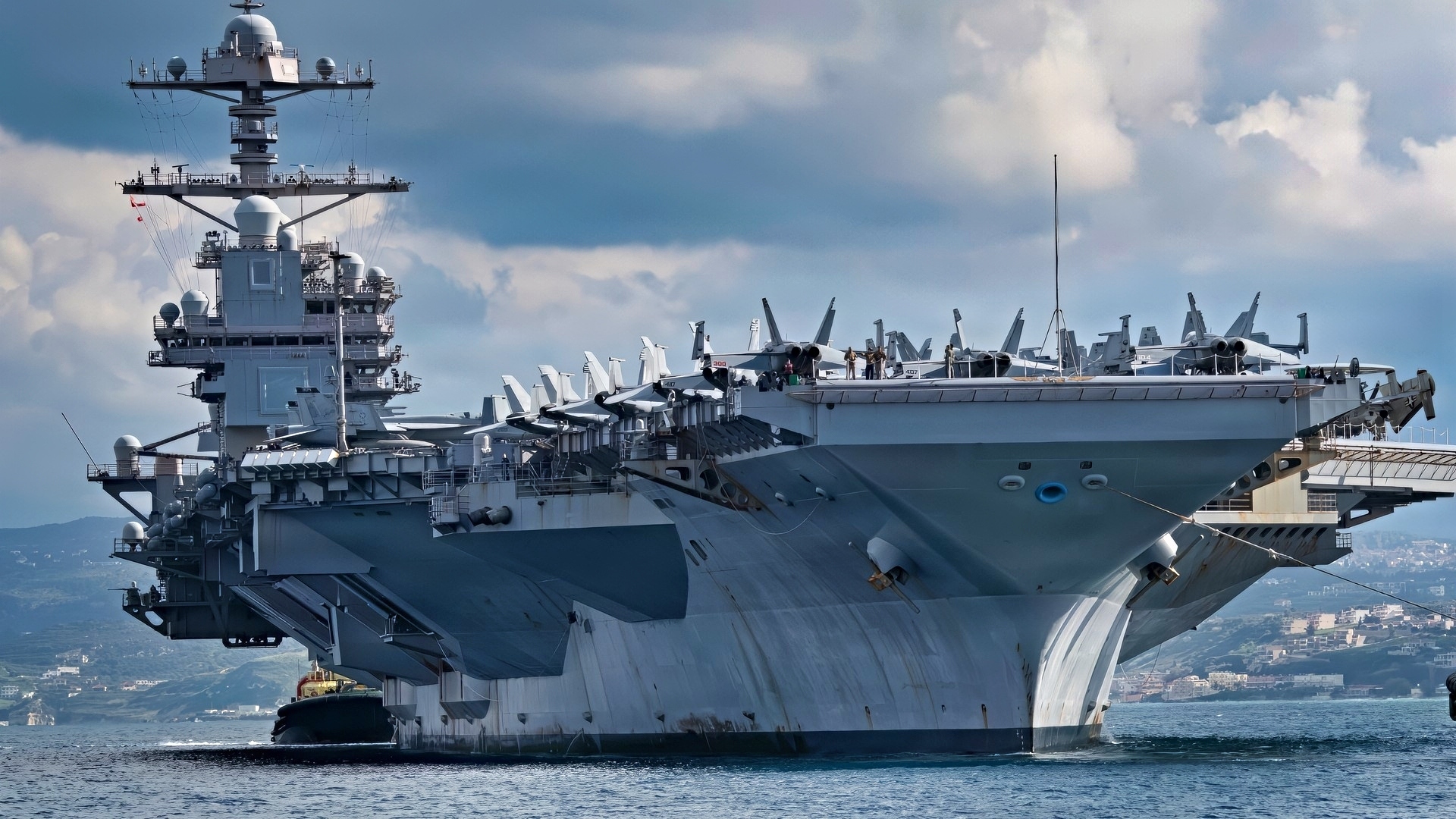 NAVAL SUPPORT ACTIVITY SOUDA BAY, Greece (Feb. 23, 2026) The world’s largest aircraft carrier, Ford-class aircraft carrier USS Gerald R. Ford (CVN 78) arrives at the NATO Marathi Pier Complex in Souda Bay, Crete, Greece, during a scheduled port visit on Feb. 23, 2026. NSA Souda Bay is an operational ashore installation that enables and supports U.S., Allied, Coalition, and partner nation forces to preserve security and stability in the European, African, and Central Command areas of responsibility. (U.S. Navy photo by Mass Communication Specialist 3rd Class Hannah Donahue)