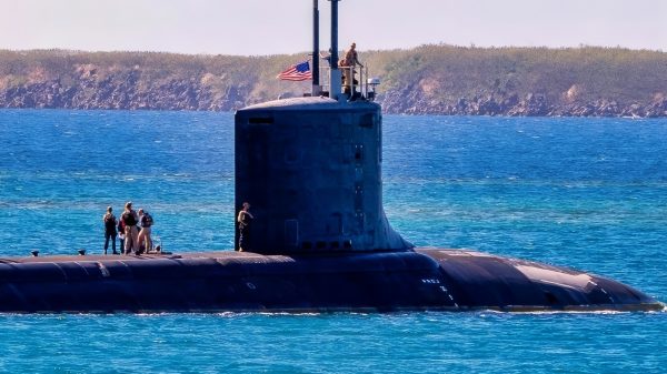 NAVAL BASE GUAM (Jan. 18, 2025) – The Virginia-class fast-attack submarine USS Minnesota (SSN 783) transits Apra Harbor, Naval Base Guam, Jan. 18, 2025. Assigned to Commander, Submarine Squadron 15, based at Polaris Point, Naval Base Guam, Minnesota is one of five forward-deployed fast-attack submarines. Renowned for their unparalleled speed, endurance, stealth, and mobility, fast-attack submarines are the backbone of the Navy’s submarine force. Regarded as apex predators of the sea, Guam’s fast-attack submarines serve at the tip of the spear, helping to reaffirm the submarine force's forward-deployed presence in support of a free and open Indo-Pacific. (U.S. Navy photo by Lt. James Caliva)