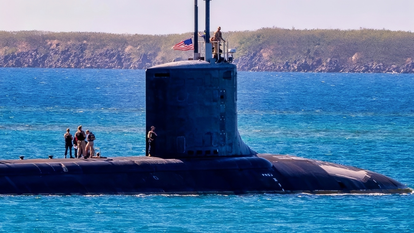 NAVAL BASE GUAM (Jan. 18, 2025) – The Virginia-class fast-attack submarine USS Minnesota (SSN 783) transits Apra Harbor, Naval Base Guam, Jan. 18, 2025. Assigned to Commander, Submarine Squadron 15, based at Polaris Point, Naval Base Guam, Minnesota is one of five forward-deployed fast-attack submarines. Renowned for their unparalleled speed, endurance, stealth, and mobility, fast-attack submarines are the backbone of the Navy’s submarine force. Regarded as apex predators of the sea, Guam’s fast-attack submarines serve at the tip of the spear, helping to reaffirm the submarine force's forward-deployed presence in support of a free and open Indo-Pacific. (U.S. Navy photo by Lt. James Caliva)