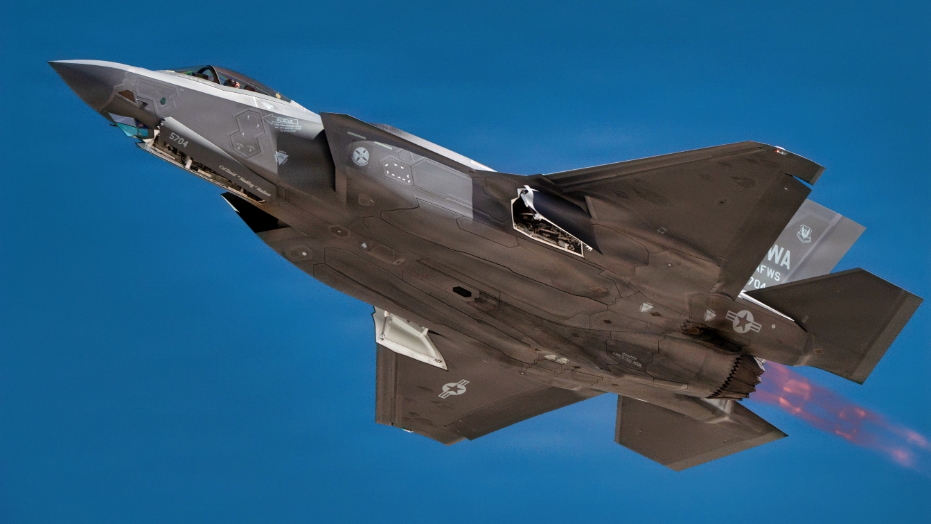 A U.S. Air Force F-22 Raptor aircraft assigned to the 433rd Weapons Squadron takes off during the U.S. Air Force Weapons School Integration at Nellis Air Force Base, Nevada, June 9, 2026. WSINT is a graduate-level training event that integrates multi-domain assets in large-force scenarios, enabling U.S. Air Force and joint service members to refine tactical expertise and employ advanced capabilities in a dynamic threat environment. (U.S. Air Force photo by Airman 1st Class Bella Swarr)