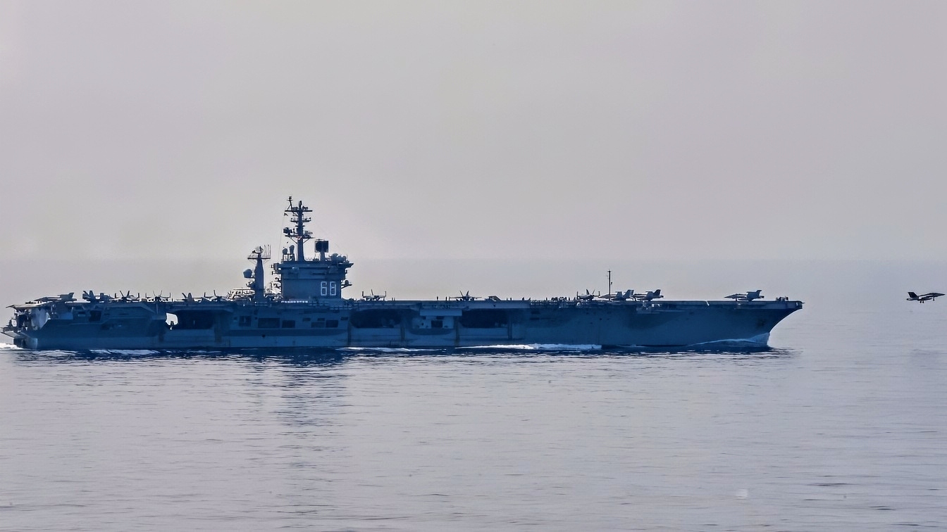 SOUTH CHINA SEA (Jan. 15, 2022) A U.S. Navy aircraft launches from the flight deck of the aircraft carrier USS Nimitz (CVN 68). Nimitz in U.S. 7th Fleet conducting routine operations. 7th Fleet is the U.S. Navy's largest forward-deployed numbered fleet, and routinely interacts and operates with Allies and partners in preserving a free and open Indo-Pacific region. (U.S. Navy photo by Mass Communication Specialist 3rd Class Carson Croom)