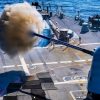 PACIFIC OCEAN (April 27, 2026) U.S. Navy Arleigh Burke-Class guided-missile destroyer USS John Paul Jones (DDG) 53, fires its Mk.45 5-inch deck cannon during a live fire exercise, April 27, 2026. John Paul Jones, part of the Theodore Roosevelt Carrier Strike Group, is underway in the U.S. 3rd Fleet area of operation conducting advanced training to bolster strike group readiness and capability. (U.S. Navy photo by Mass Communications Specialist 2nd Class Ryan Holloway)