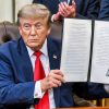 President Donald J. Trump signs executive orders alongside Utah Governor Spencer Cox and members of the Utah congressional delegation in the Oval Office, Monday, July 13, 2026. (Official White House Photo by Molly Riley)