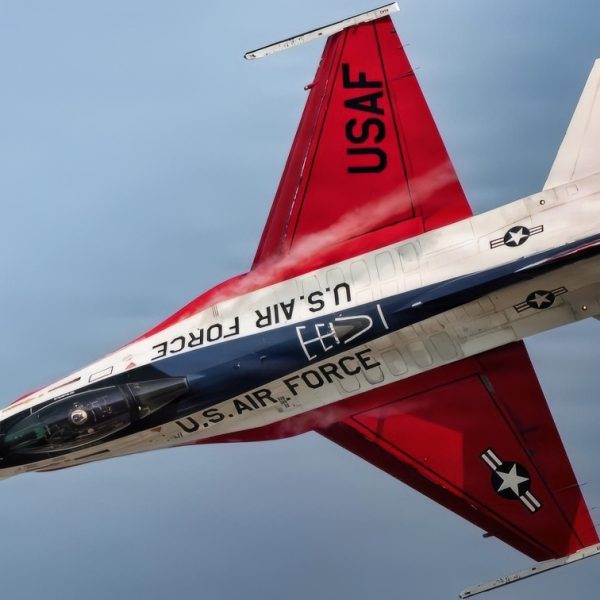 U.S. Air Force Maj. Taylor “FEMA” Hiester, F-16 Viper Demonstration Team commander and pilot, performs aerial maneuvers in a U.S. Air Force F-16C Fighting Falcon during AirVenture at Oshkosh, Wisconsin, July 24, 2026. The F-16, a multi-role fighter aircraft capable of both air-to-air and air-to-ground combat, demonstrates its versatility through dynamic aerial demonstrations across the U.S. and abroad. (U.S. Air Force photo by Staff Sgt. Steven Cardo)