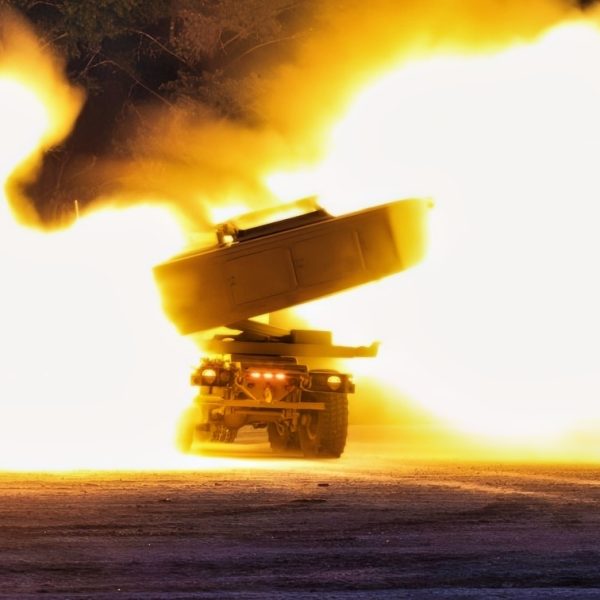 U.S. Soldiers assigned to the Blackhawk Battery, 1st Battalion, 14th Field Artillery Regiment, 75th Field Artillery Brigade, fire an M142 High Mobility Artillery Rocket System during a night live fire training as part of Exercise Spring Storm 23 held at Camp Tapa, Estonia, May 25, 2023. (U.S. Army National Guard photo by Staff Sgt. Agustín Montañez)