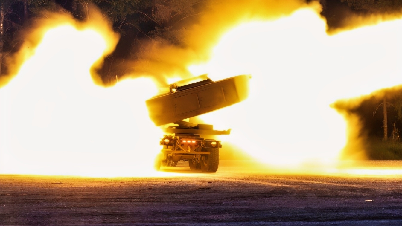 U.S. Soldiers assigned to the Blackhawk Battery, 1st Battalion, 14th Field Artillery Regiment, 75th Field Artillery Brigade, fire an M142 High Mobility Artillery Rocket System during a night live fire training as part of Exercise Spring Storm 23 held at Camp Tapa, Estonia, May 25, 2023. (U.S. Army National Guard photo by Staff Sgt. Agustín Montañez)