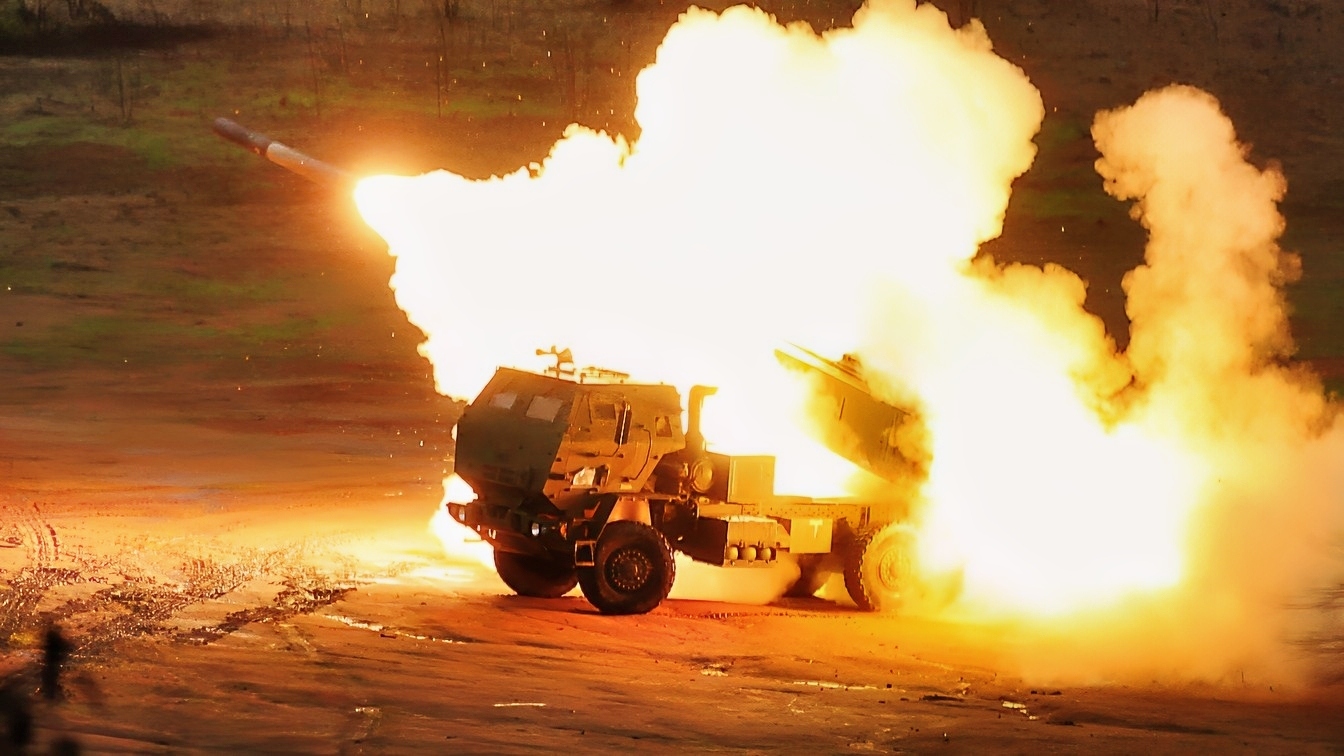 U.S. Marines with 1st Battalion, 11th Marine Regiment, fire a M142 High Mobility Artillery Rocket System (HIMARS), a truck mounted multiple-rocket launcher system, during exercise Steel Knight at Marine Corps Base Camp Pendleton, Calif., Dec. 13, 2012. The battalion conducted this historic live-fire exercise, simultaneously utilizing HIMARS, M777 Lightweight Howitzer and Expeditionary Fire Support System. This is the first time all three artillery weapons systems were fired during the same exercise. (DoD photo by LCpl Joseph Scanlan, U.S. Marine Corps/Released)