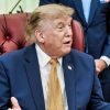 President Donald J. Trump, joined by Secretary of War Pete Hegseth and wife Jennifer Hegseth, signs an executive order creating a new White House commission focused on military families, Monday, August 3, 2026, in the Oval Office. (Official White House Photo by Molly Riley)