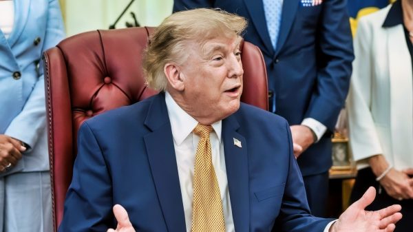 President Donald J. Trump, joined by Secretary of War Pete Hegseth and wife Jennifer Hegseth, signs an executive order creating a new White House commission focused on military families, Monday, August 3, 2026, in the Oval Office. (Official White House Photo by Molly Riley)