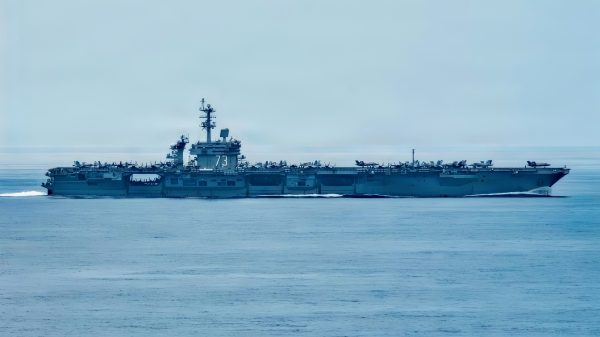 Nimitz-class aircraft carrier USS George Washington (CVN 73) conducts routine operations while underway in the South China sea July 23, 2026. The George Washington Carrier Strike Group is operating in the U.S. 7th Fleet area of operations. George Washington is the U.S. Navy’s premiere forward-deployed aircraft carrier, a long-standing symbol of the United States’ commitment to maintaining a free and open Indo-Pacific, while operating alongside allies and partners across the U.S. Navy’s largest numbered fleet. (U.S. Navy photo by Mass Communication Specialist Seaman Andrew Novak)