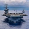 Twenty-six ships from 13 partner and allied nations steam in formation with Nimitz-class aircraft carrier USS Nimitz (CVN 68) during a multinational maritime exercise as part of Fleet Exercise (FLEETEX) 250 in the Atlantic Ocean, June 25, 2026. Nimitz is underway taking part in FLEETEX 250, a series of structured multilateral training events at-sea, aimed at building cohesiveness, validating tactical procedures, and strengthening the interoperability of participating units—which include warships, aircraft, and crews from the U.S. and 13 partner and ally nations. (U.S. Navy photo by Mass Communication Specialist Seaman Julian Jaime)