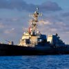 U.S. Sailors pilot a rigid-hull inflatable boat toward Arleigh Burke-class guided-missile destroyer USS Rafael Peralta (DDG 115), as seen from Arleigh Burke-class guided-missile destroyer USS Milius (DDG 69), Oct. 2, 2026. Milius and Rafael Peralta are deployed to the U.S. 5th Fleet area of operations to support maritime security and stability in the Middle East. (U.S. Navy photo)