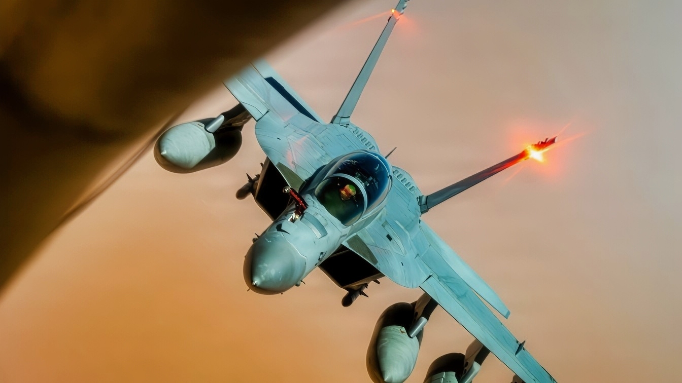 A U.S. Navy F/A-18 Super Hornet approaches a U.S. Air Force KC-135 Stratotanker to refuel in the U.S. Central Command area of responsibility Aug. 3, 2026. (U.S. Air Force photo by Senior Airman Adriana Jordan-Alcaniz)